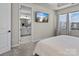 Main bedroom with ensuite bathroom access and large windows at 118 Berkeley Ave # D, Mooresville, NC 28117