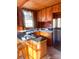 Cozy kitchen featuring wood cabinets and granite countertops at 1386 Old Pinckney Rd, York, SC 29745