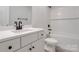 This bathroom features a modern vanity with white countertops, matte black fixtures, and a tiled shower at 119 E Ohio Ave, Bessemer City, NC 28016