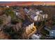 Aerial perspective of three townhouses near the city skyline at 158 Mattoon St, Charlotte, NC 28216