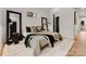 Spacious bedroom with a large bed and neutral tones at 158 Mattoon St, Charlotte, NC 28216