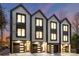 Three modern townhouses with attached garages and stylish exterior at 158 Mattoon St, Charlotte, NC 28216