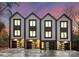 Three modern townhouses with attached garages and stylish exterior at 158 Mattoon St, Charlotte, NC 28216