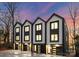 Three modern townhouses with attached garages and stylish exterior at 158 Mattoon St, Charlotte, NC 28216