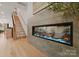 Modern linear fireplace with gray tile surround at 158 Mattoon St, Charlotte, NC 28216