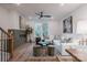 Bright living room with white sectional sofa and a fireplace at 158 Mattoon St, Charlotte, NC 28216