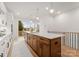 Modern kitchen with large island and access to deck at 160 Mattoon St, Charlotte, NC 28216
