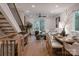 Elegant dining area with hardwood floors and stylish light fixtures at 162 Mattoon St, Charlotte, NC 28216