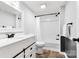 Clean bathroom with white vanity, shower-tub combo, and contrasting black hardware at 3107 Balkan Dr, York, SC 29745