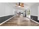 Bright open-concept living room featuring wood floors with access to kitchen and exterior deck at 3107 Balkan Dr, York, SC 29745