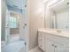 Clean bathroom with white vanity, single sink, and tiled floor at 5306 Club View Dr, Concord, NC 28025