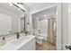 Modern bathroom with soaking tub, vanity, and frameless mirror at 5319 Carden Dr, Charlotte, NC 28227