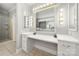 Bathroom vanity area with bright lighting and adjacent shower enclosure at 2545 Rea Rd, Charlotte, NC 28226