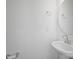 Clean half-bath featuring a sink, toilet, and a minimalist style at 4018 Capital Ridge Ct, Charlotte, NC 28205
