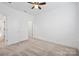 Neutral bedroom featuring a ceiling fan and plush carpeting, ready for personalization and comfort at 4018 Capital Ridge Ct, Charlotte, NC 28205