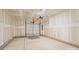 Spacious unfinished two-car garage with concrete floor, ready for customization and storage at 4018 Capital Ridge Ct, Charlotte, NC 28205