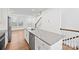 Kitchen island with stainless steel dishwasher and sink, complemented by modern countertops at 4018 Capital Ridge Ct, Charlotte, NC 28205