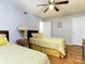 Bedroom with two twin beds, dresser and wood floors at 4609 Coronado Dr # O, Charlotte, NC 28212