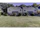 Back exterior view of house and yard at 4609 Coronado Dr # O, Charlotte, NC 28212