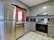 Kitchen with stainless steel appliances and granite countertops at 4609 Coronado Dr # O, Charlotte, NC 28212