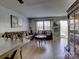 Living room with hardwood floors and leather couches at 4609 Coronado Dr # O, Charlotte, NC 28212