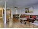 Open living and dining area with hardwood floors at 4609 Coronado Dr # O, Charlotte, NC 28212