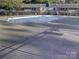 Community pool with surrounding fence at 4609 Coronado Dr # O, Charlotte, NC 28212