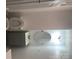 Bathroom features a vanity with oval mirror and a toilet at 605 N Mcfarland N St, Gastonia, NC 28054