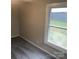 A cozy bedroom featuring soft gray walls and plush carpeting for ultimate comfort at 605 N Mcfarland N St, Gastonia, NC 28054