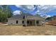 The home features a large backyard with a covered patio perfect for outdoor entertaining at 217 Heartland Dr, Rock Hill, SC 29732