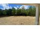 An expansive, private backyard, framed by lush trees, offers endless possibilities at 217 Heartland Dr, Rock Hill, SC 29732