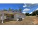Exterior of the home highlighting the covered patio area and backyard space at 217 Heartland Dr, Rock Hill, SC 29732