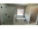 Bathroom featuring a glass shower and free standing soaking tub at 217 Heartland Dr, Rock Hill, SC 29732