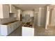 Spacious unfinished kitchen with white cabinetry awaiting countertops and appliances at 217 Heartland Dr, Rock Hill, SC 29732