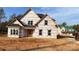 New home under construction featuring a classic design, large windows, and a gabled roof at 227 Heartland Dr, Rock Hill, SC 29732