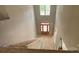 Unfinished foyer features a beautiful wood front door and soaring ceilings at 227 Heartland Dr, Rock Hill, SC 29732