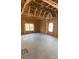 Unfinished room with exposed wood framing, showcasing the large windows and natural light at 227 Heartland Dr, Rock Hill, SC 29732