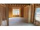 Interior framing view with large windows and an open space ready for customization at 227 Heartland Dr, Rock Hill, SC 29732