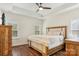 Main bedroom with hardwood floors and large windows at 2624 Woodlands Creek Dr, Monroe, NC 28110