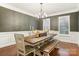 Formal dining room featuring a chandelier and hardwood floors at 2624 Woodlands Creek Dr, Monroe, NC 28110