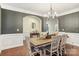 Spacious dining room with farmhouse table and bench at 2624 Woodlands Creek Dr, Monroe, NC 28110