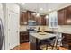 Island kitchen with stainless steel appliances and granite countertops at 2624 Woodlands Creek Dr, Monroe, NC 28110