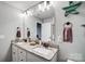 Bathroom featuring dual sinks, granite countertops, tile floors, a large mirror, and a shower at 3018 Corinth Church Rd, Monroe, NC 28112