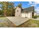 Home exterior with driveway, two-car garage, and basketball hoop at 3018 Corinth Church Rd, Monroe, NC 28112