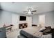 A spacious main bedroom featuring neutral colors, a ceiling fan, and an ensuite bathroom at 3018 Corinth Church Rd, Monroe, NC 28112