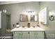 Bathroom with double vanity and a large medicine cabinet at 3401 Stony Brook Cir, Newton, NC 28658