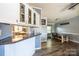 Kitchen and dining area with farmhouse table and chairs at 3401 Stony Brook Cir, Newton, NC 28658