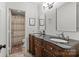 Bathroom with double vanity, dark countertop, and a separate shower at 7062 Quail Hill Rd, Charlotte, NC 28210