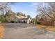 Private carport and exterior view of the home at 7062 Quail Hill Rd, Charlotte, NC 28210