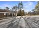 View of the parking area and community entrance at 7062 Quail Hill Rd, Charlotte, NC 28210